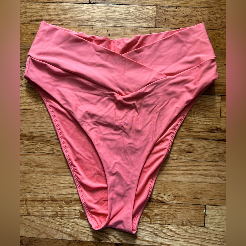 Coral pink crossbody aerie cheeky swim bottoms.